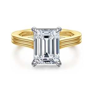 Gabriel & Co. ER16981E12M4JJJ 14 karat white and yellow gold Contemporary engagement ring, front view of an emerald cut center held by four rounded paddle shaped prongs