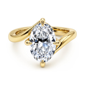 Gabriel & Co. ER16994O14Y4JJJ 14 karat yellow gold Contemporary engagement ring, front view of a tilted oval center between the crossing arms of a smooth polished band
