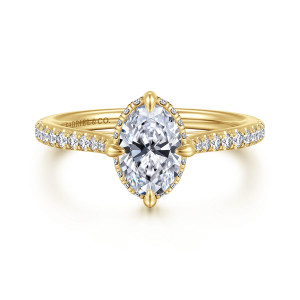 Gabriel & Co. ER16997O4Y44JJ 14 karat yellow gold Contemporary engagement ring, front view of an oval center with tiny stones circling its seat and stones along the band