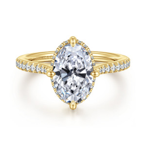 Gabriel & Co. ER16997O8Y44JJ 14 karat yellow gold Contemporary engagement ring, front view of an oval center with rounded prong tips and tiny stones peeking out at its edge