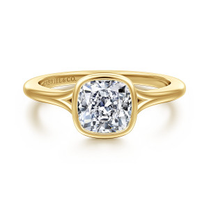 Gabriel & Co. ER17000C6Y4JJJ 14 karat yellow gold Contemporary engagement ring, front view of a cushion center in a smooth bezel over a split shank