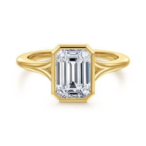 Gabriel & Co. ER17000E8Y4JJJ 14 karat yellow gold Contemporary engagement ring, front view of a smooth bezel with clipped corners around an emerald cut center