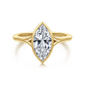 Gabriel & Co. ER17000M6Y4JJJ 14 karat yellow gold Contemporary engagement ring, front view of a marquise center in a smooth bezel with the split shank parting at each side