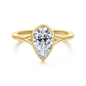 Gabriel & Co. ER17000P6Y4JJJ 14 karat yellow gold Contemporary engagement ring, front view of a pear shaped center in a smooth bezel with the split shank behind