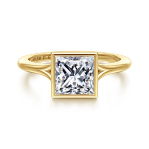 Gabriel & Co. ER17000S6Y4JJJ 14 karat yellow gold Contemporary engagement ring, front view of a square bezel around a princess cut center with the split shank parting