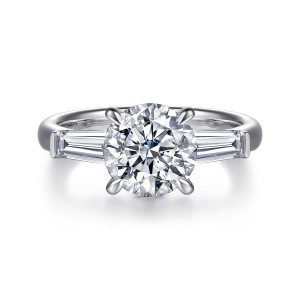 Gabriel & Co. ER17022R8W43JJ 14 karat white gold Lotus engagement ring, front view of a round center on slender claws with tapered baguettes at either side