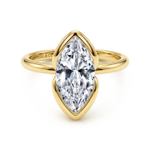 Gabriel & Co. ER17028M12Y4JJJ 14 karat yellow gold Contemporary engagement ring, front view of a marquise center held by a glossy bezel that curls around its pointed ends
