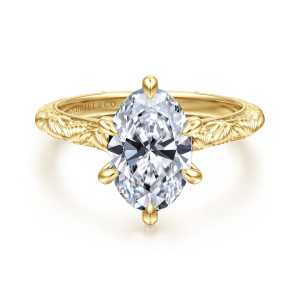 Gabriel & Co. ER17029O8Y4JJJ 14 karat yellow gold Victorian engagement ring, front view of an upright oval center, six teardrop tipped prongs and engraved petal shoulders