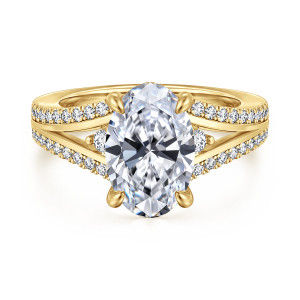 Gabriel & Co. ER17030O12Y44JJ 14 karat yellow gold Contemporary engagement ring, front view of an oval center with a small round diamond at each side above split diamond strands