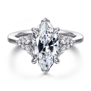 Gabriel & Co. ER17032M12W44JJ 14 karat white gold Starlight engagement ring, front view of the marquise center with rounded prongs and mixed clusters on both shoulders