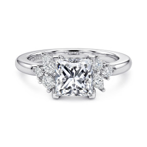Gabriel & Co. ER17072S6W44JJ 14 karat white gold Starlight engagement ring, front view of a princess cut center with square edged corner prongs and diamond clusters at both sides