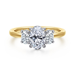 Gabriel & Co. ER17085O4M44JJ 14 karat white and yellow gold Contemporary engagement ring, front view of an oval center between two oval side stones on a plain band