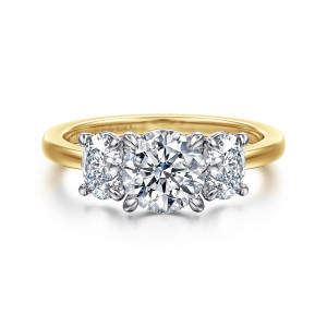 Gabriel & Co. ER17086R4M44JJ 14 karat white and yellow gold Contemporary engagement ring, front view of a round center flanked by oval side stones on a smooth plain band