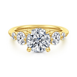 Gabriel & Co. ER17097R8Y44JJ 14 karat yellow gold Contemporary engagement ring, front view of the round center with a larger and a smaller stone at each side