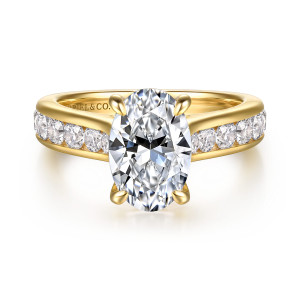 Gabriel & Co. ER17099O8Y44JJ 14 karat yellow gold Classic engagement ring, front view of the oval center between rising shoulders lined with channel set round diamonds