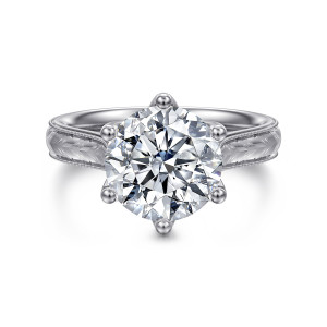 Gabriel & Co. ER17103R12W4JJJ 14 karat white gold Victorian engagement ring, front view of a round center gripped by ball tipped prongs and engraved beaded shoulders
