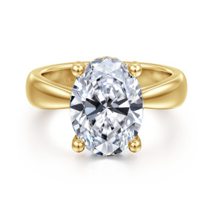Gabriel & Co. ER17105O14Y44JJ 14 karat yellow gold Contemporary engagement ring, front view of an oval center on four ball tipped prongs above a smooth band