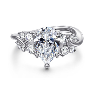 Gabriel & Co. ER17106P8W44JJ 14 karat white gold Floral Nouveau engagement ring, front view of a pear shaped center in ball tipped prongs with round diamonds beside it