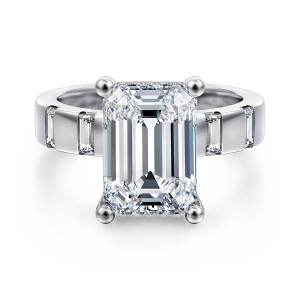 Gabriel & Co. ER17107E18W44JJ 14 karat white gold Contemporary engagement ring, front view of an emerald cut center in four ball tipped prongs with baguettes on the shoulders