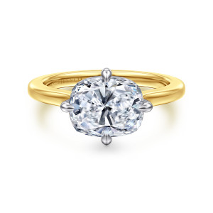 Gabriel & Co. ER17130G10M4JJJ 14 karat white and yellow gold Contemporary engagement ring, front view of the rounded center lying sideways between four slim claws