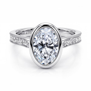 Gabriel & Co. ER17135O8W4JJJ 14 karat white gold Victorian engagement ring, front view of an oval center in a smooth bezel with scroll engraved shoulders