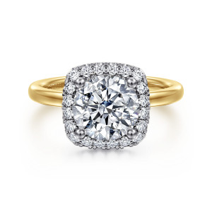 Gabriel & Co. ER17186R8M44JJ 14 karat white and yellow gold Contemporary engagement ring, front view of a round center inside a cushion shaped halo with ball tipped corner prongs