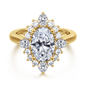 Gabriel & Co. ER17189O8Y44JJ 14 karat yellow gold Starlight engagement ring, front view of an oval center inside a starburst halo with a larger elongated stone at each end
