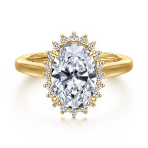 Gabriel & Co. ER17190O12Y44JJ 14 karat yellow gold Contemporary engagement ring, front view of an oval center inside a single halo of round diamonds with beads between them