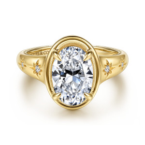 Gabriel & Co. ER17369O8Y44JJ 14 karat yellow gold Victorian engagement ring, front view of an oval center inside a smooth frame with star bursts on both shoulders