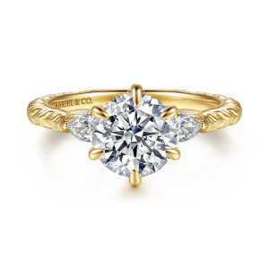 Gabriel & Co. ER17377R8Y44JJ 14 karat yellow gold Lotus engagement ring, front view of the round center held by teardrop tipped claws between two side diamonds