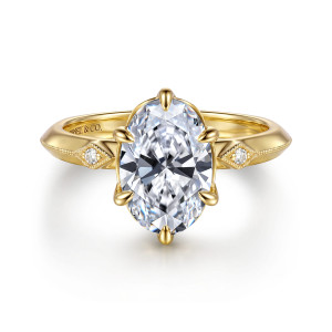 Gabriel & Co. ER17379O8Y44JJ 14 karat yellow gold Victorian engagement ring, front view of an oval center in six claw prongs with a lozenge diamond on each shoulder