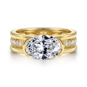 Gabriel & Co. ER17384O8Y44JJ 14 karat yellow gold Contemporary engagement ring, front view of the sideways oval with curved end tabs and small diamonds on both shoulders