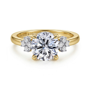 Gabriel & Co. ER17390R8Y44JJ 14 karat yellow gold Contemporary engagement ring, front view of a round center with a cluster of small round diamonds on each shoulder
