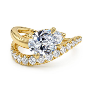 Gabriel & Co. ER17398P8Y44JJ 14 karat yellow gold Contemporary engagement ring, angled view of a pear shaped center above a row of round diamonds on one sweeping arm