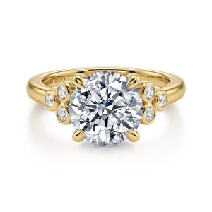 Gabriel & Co. ER17411R12Y44JJ 14 karat yellow gold Contemporary engagement ring, front view of a round center flanked by clustered bezel diamonds at each shoulder