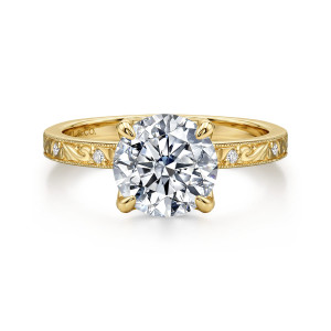 Gabriel & Co. ER17415R8Y44JJ 14 karat yellow gold Victorian engagement ring, front view of a round center over engraved shoulders dotted with tiny diamonds