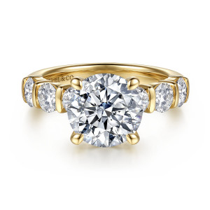 Gabriel & Co. ER17416R12Y44JJ 14 karat yellow gold Contemporary engagement ring, front view of a round center flanked by round diamonds held between upright metal bars