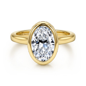 Gabriel & Co. ER17419O8Y44JJ 14 karat yellow gold Contemporary engagement ring, front view of an oval center inside a smooth bezel rim above a plain band
