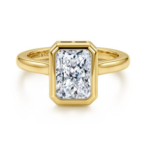 Gabriel & Co. ER17421N8Y43JJ 14 karat yellow gold Contemporary engagement ring, front view of a clipped corner bezel around a radiant cut center
