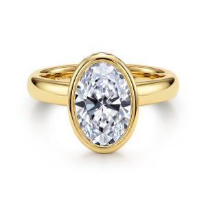Gabriel & Co. ER17422O8Y44JJ 14 karat yellow gold Contemporary engagement ring, front view of the oval center wrapped in a smooth bezel rim on a plain rounded band