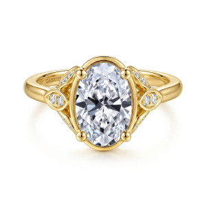 Gabriel & Co. ER17431O8Y44JJ 14 karat yellow gold Contemporary engagement ring, front view of an oval center inside a thin oval rim with leaf motifs at each shoulder