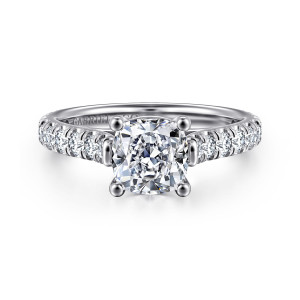Gabriel & Co. ER7016C6W44JJ 14 karat white gold Classic engagement ring, front view of a cushion center on ball tipped prongs with diamonds starting beside the head