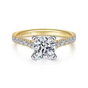 Gabriel & Co. ER7225M44JJ 14 karat white and yellow gold Classic engagement ring, front view of the round center with flat faced prongs and diamonds running down both shoulders