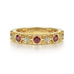 Gabriel & Co. LR4844Y45GN 14 karat yellow gold Stackable ring, front view of curled scrollwork between red bezel stones and round diamonds