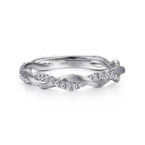 Gabriel & Co. LR50886W45JJ 14 karat white gold Stackable ring, front view of the brushed strand twisting past a row of round diamonds