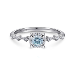 Gabriel & Co. LR51467W45AQ 14 karat white gold Color ring, front view of a light blue round stone in prongs inside a diamond frame