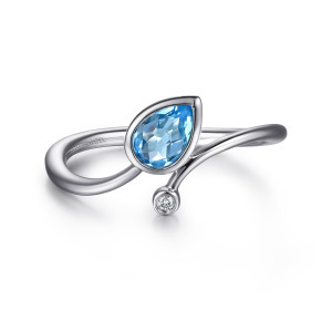 Gabriel & Co. LR52253SV5BT sterling silver Color ring, front view of a blue pear shaped bezel stone and a round diamond bezel on the passing ends