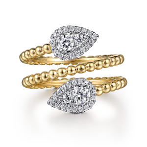 Gabriel & Co. LR52359M45JJ 14 karat white and yellow gold Bujukan ring, front view of pear shaped plates at both ends of a beaded coil passing side by side