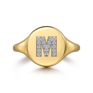 Gabriel & Co. LR52413M-Y45JJ 14 karat yellow gold Bujukan ring, top view of the polished round face with the pave letter M in a lighter bed