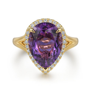 Gabriel & Co. LR52485Y45AM 14 karat yellow gold Color ring, top view of a pear shaped violet stone in a diamond frame with prongs at the tip